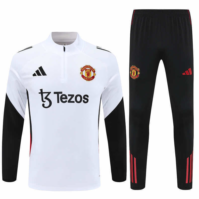 Manchester United 25/26 half-zip tréninkový set - bílé triko a černé tepláky